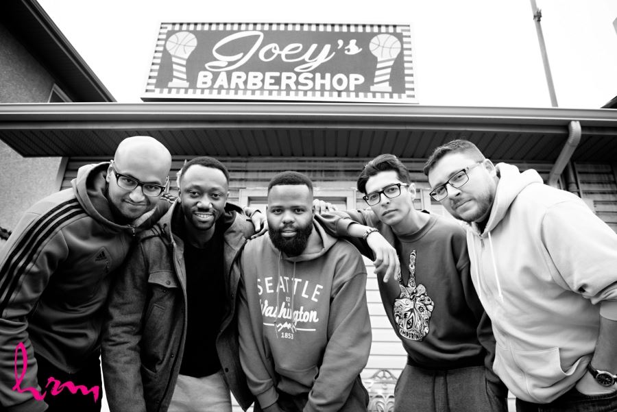 groomsmen and groom at barbers