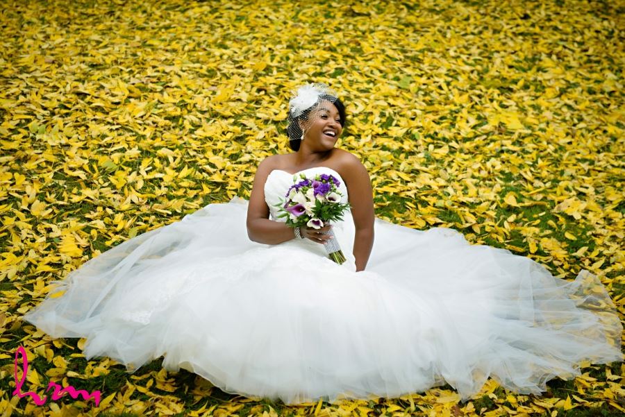 bride with autumn leaves