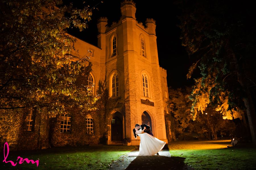 dreamy night time bride and groom dip at the old court house in london ontario