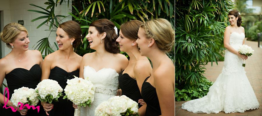 bride with bridesmaids laughing together