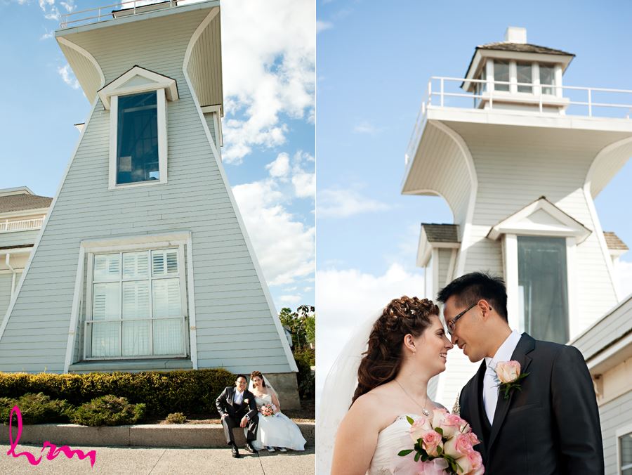 bride and groom enjoying a moment in front of light house