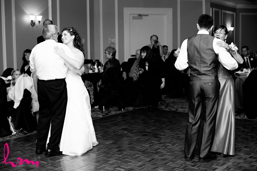 parent dances with father daughter and mother son
