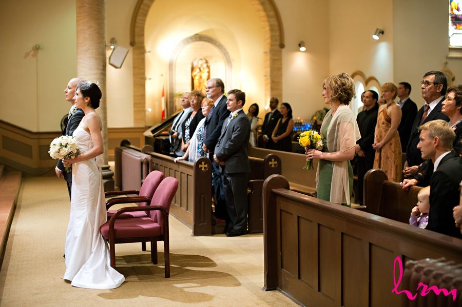 bride and groom in church with guest