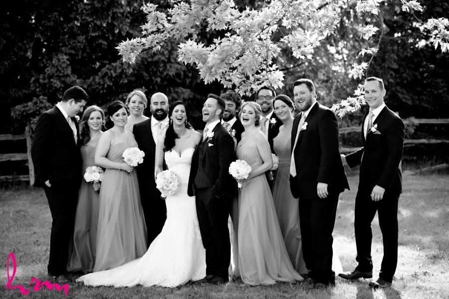 wedding party laughing outside