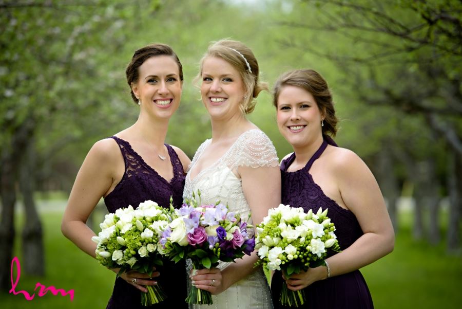 bride and bridesmaids with spring bouquets