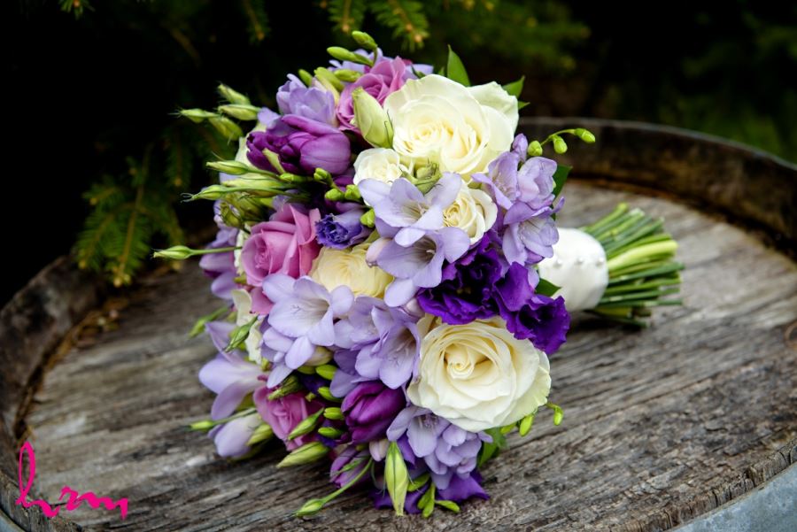 pretty spring bridal bouquet with purple pink white flower