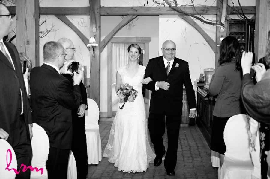 bride with father walking down aisle wedding ceremony