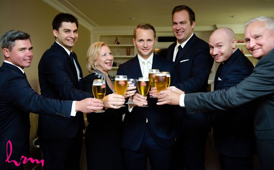 groomsmen cheers with beers