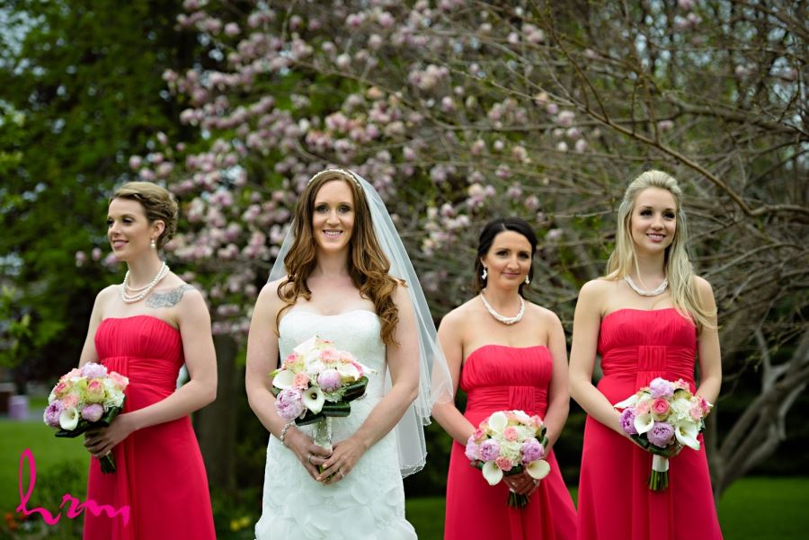 bride and bridesmaids red pink and white wedding