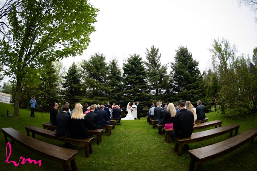 outdoor wedding ceremony wooden benches