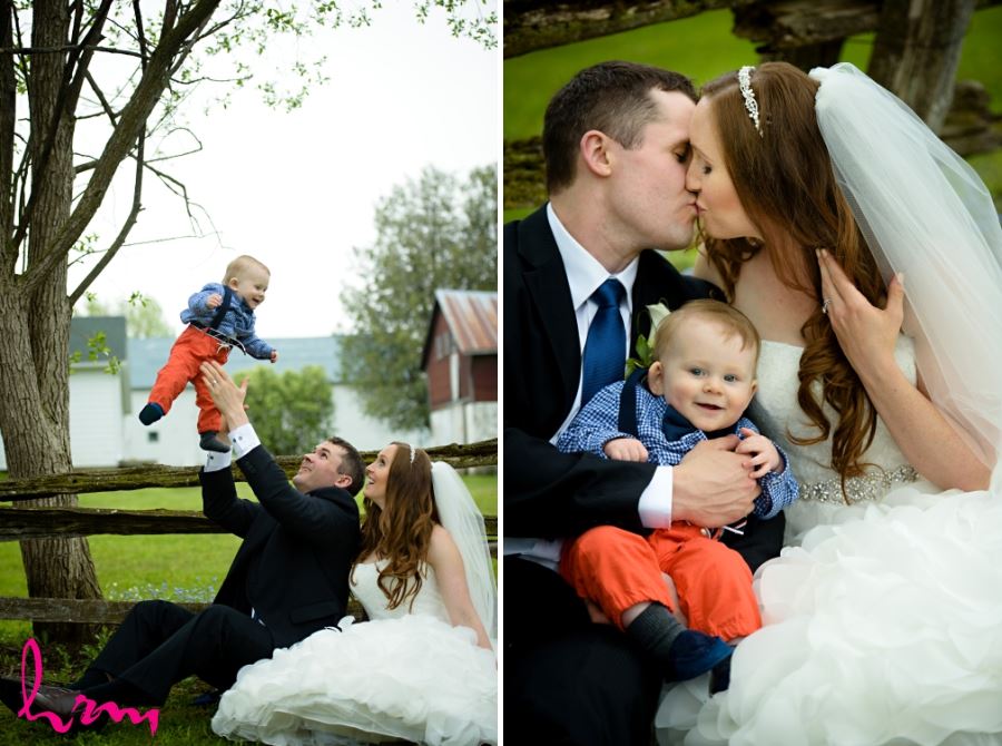 groom throwing baby into air wedding day photography