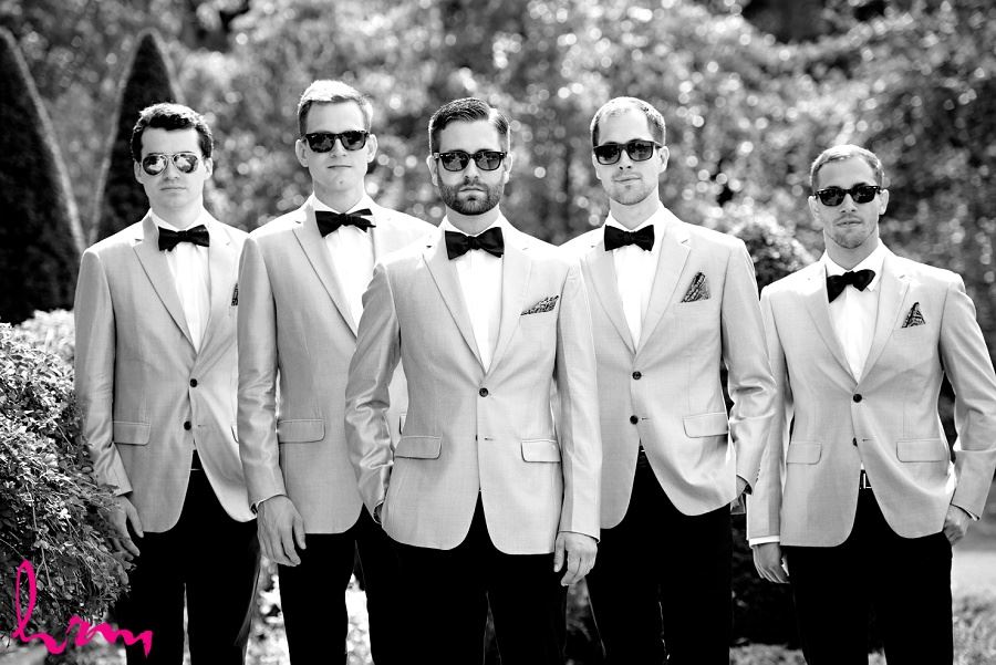 Black and white photo of groomsmen before wedding taken by HRM Photography London Ontario Wedding photographer