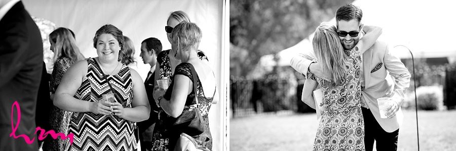 Black and white photo of greeting guests taken by HRM Photography London Ontario Wedding photographer