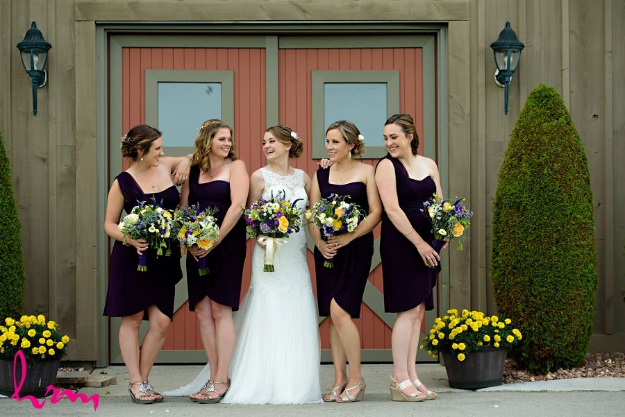Photo of bride and bridesmaids by London Ontario Wedding Photographer