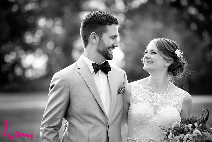 Black and white photo of bride and groom by London Ontario Wedding Photographer
