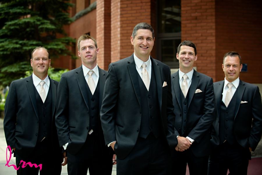 groomsmen wedding day black suit ivory tie with pocket square