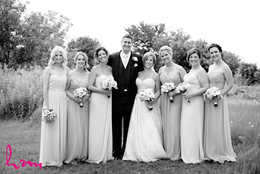 groom with bridesmaids in black and white