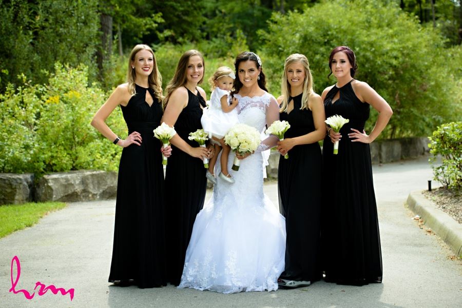 Bridesmaids and flower girl in black and white