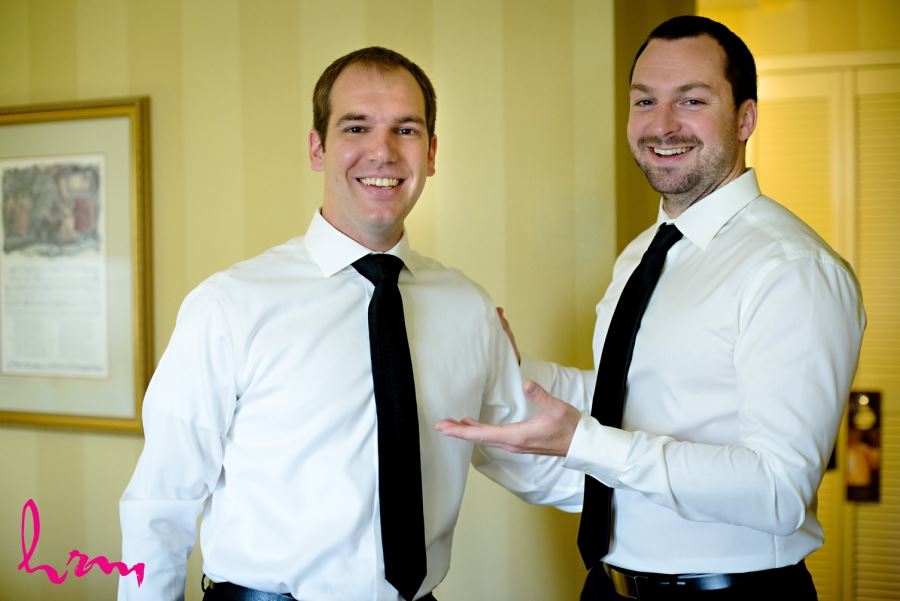 groom with groomsman wedding day with black ties