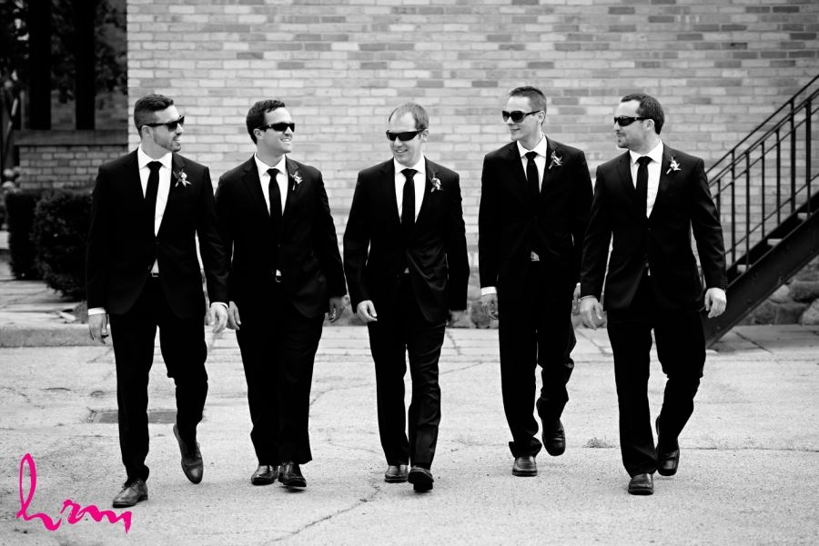 groomsmen black and white suits with sunglasses
