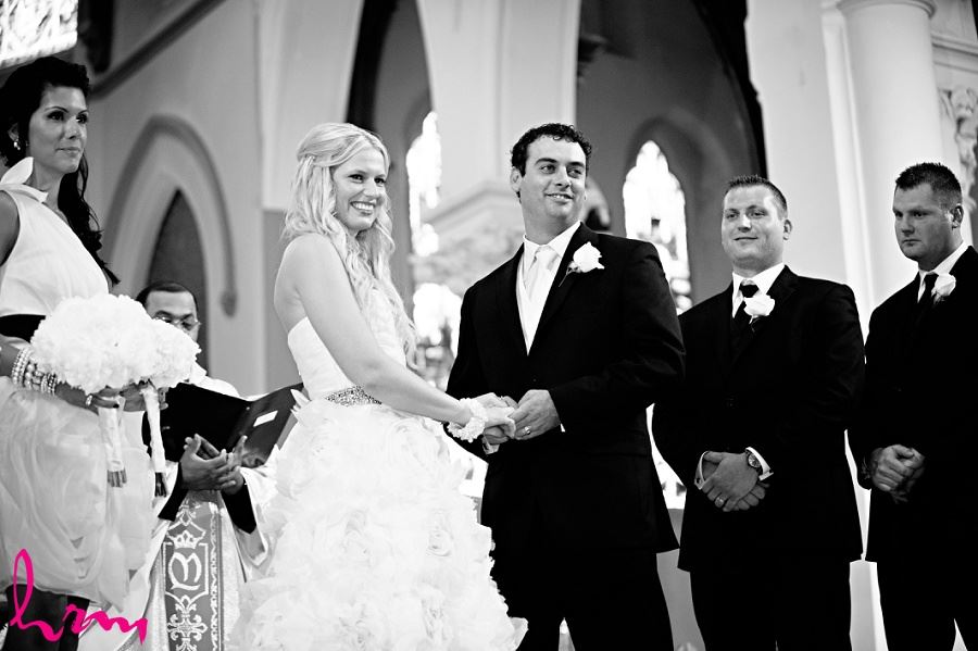 Black and white photo of bridal party at Altar taken by London Ontario wedding photographer