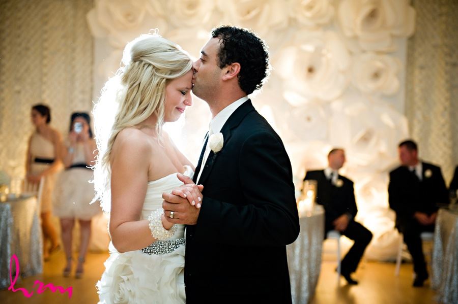 Photo of bride and groom dancing taken by London Ontario Wedding Photographer