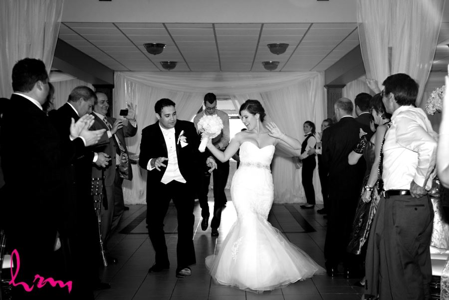 bride and groom entrance black and white