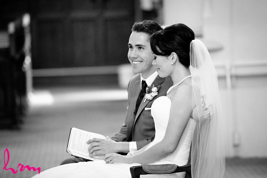 Black and white photo of Geneviève and Will in St. Peter's Cathedral London ON Wedding Photography