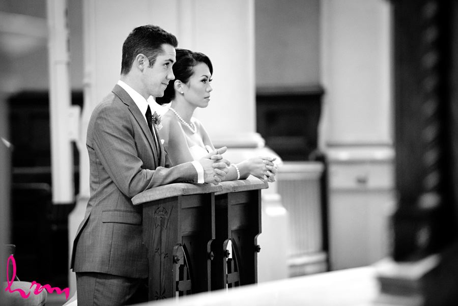 Black and white photo of the ceremony at St. Peter's Cathedral London ON Wedding Photography