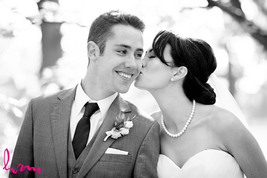Black and white photo of Geneviève + Will outside St. Peter's Cathedral London ON Wedding Photography