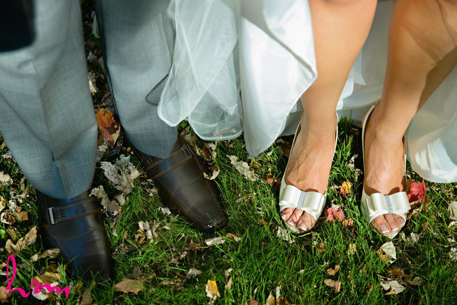 Geneviève and Will shoes in grass London ON Wedding HRM Photography