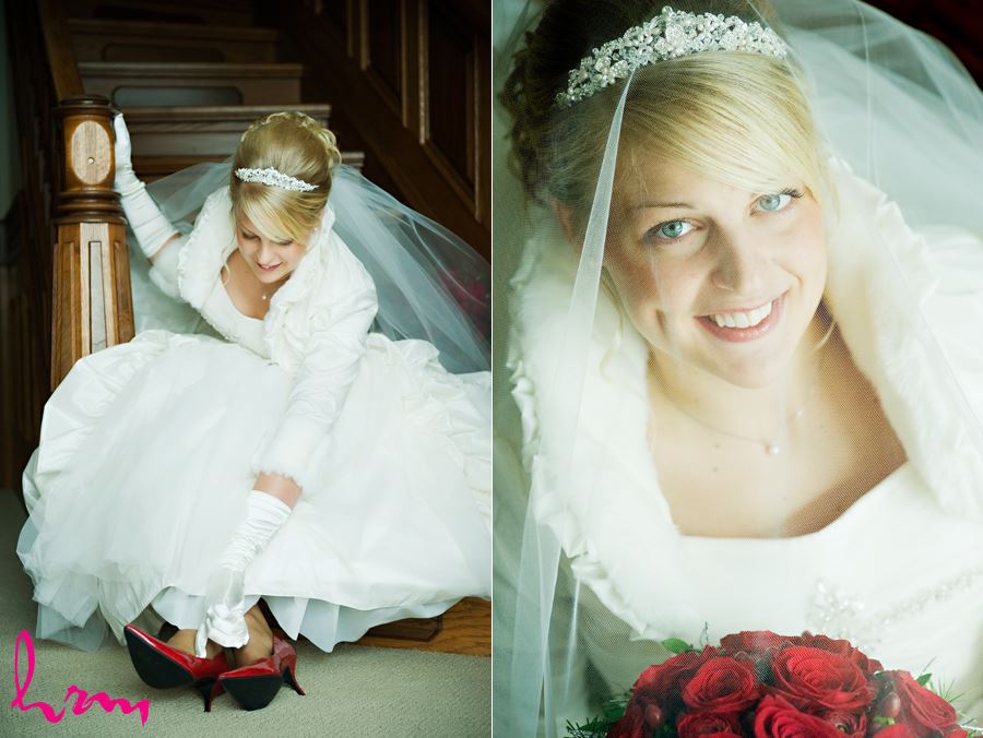 bride putting on her red shoes on staircase