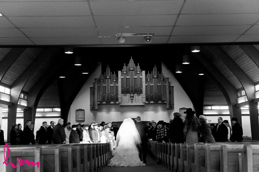 beam of light on bride walking down aisle in ingersoll ontario