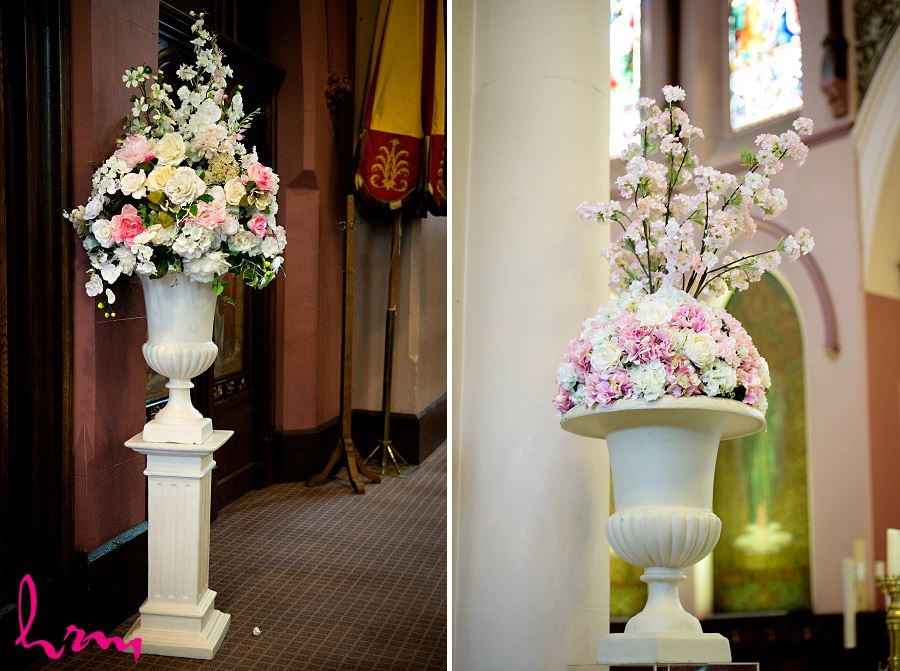 tall floral ceremony decor in urns