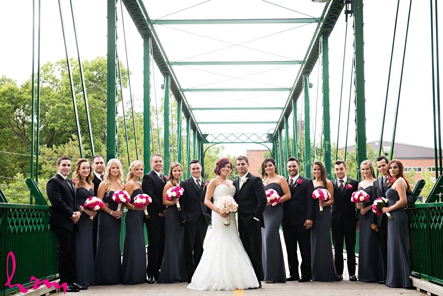 wedding party in black gray and fuschia pink