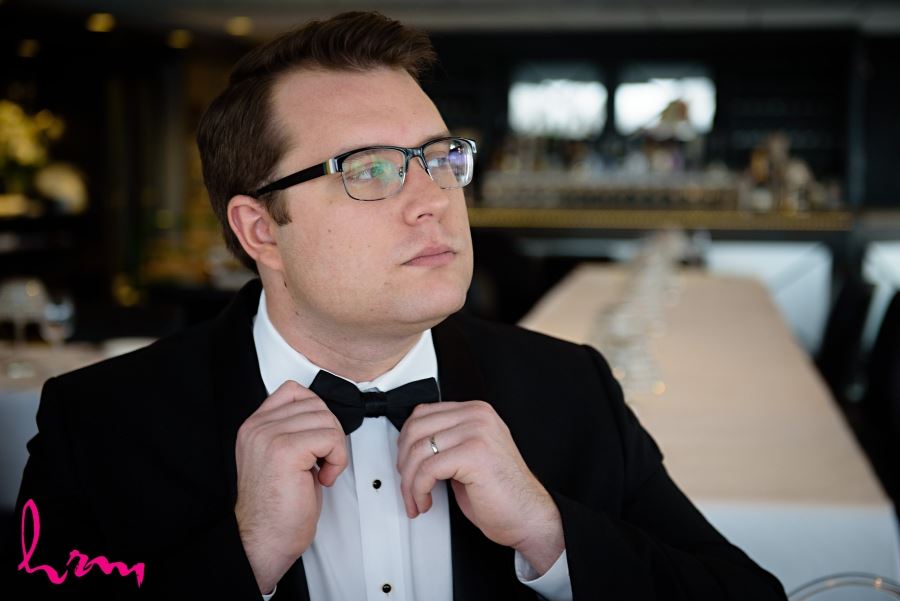 groom with bow tie and glasses