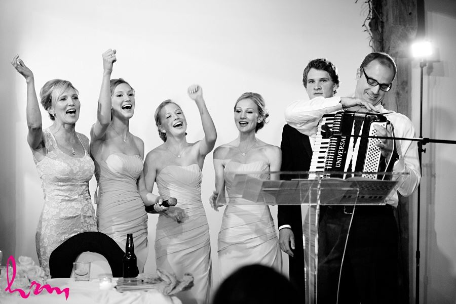 Black and white photo of singing to Sabrina and Winston at Bellamere Winery Event Centre London ON Wedding Photography