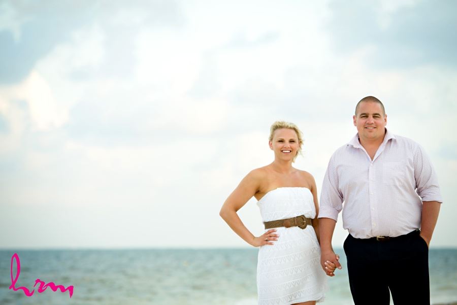 Destination wedding day after bride and groom couple pics on beach