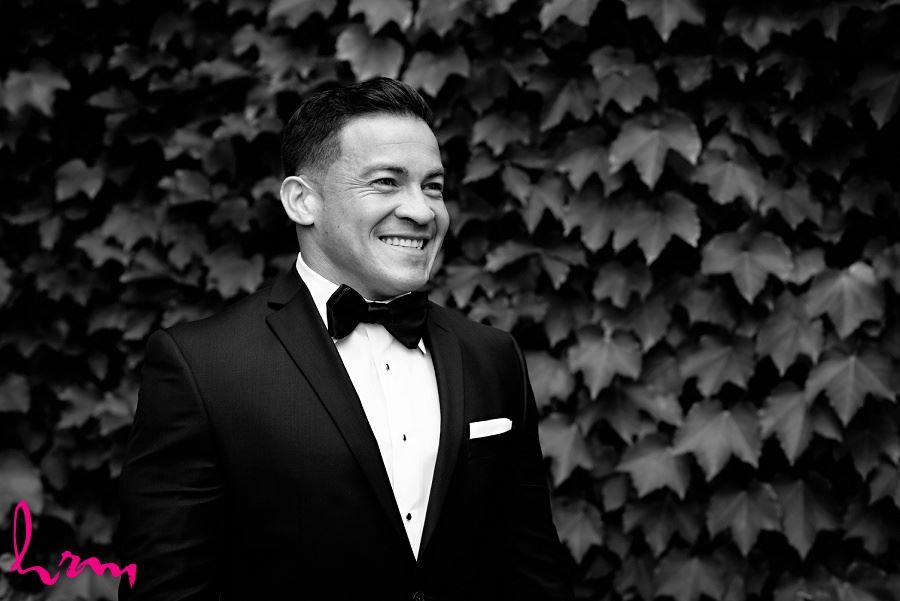 Black and white of Jose outside of Museum London London ON Wedding Photography