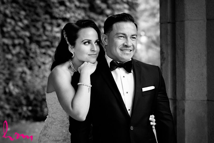Black and white photo of bride and groom together outside of Museum London London ON Wedding Photography