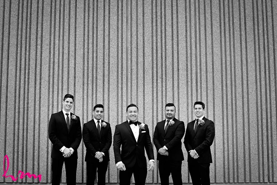 Black and white photo of Jose and groomsmen outside Museum London London ON Wedding Photography