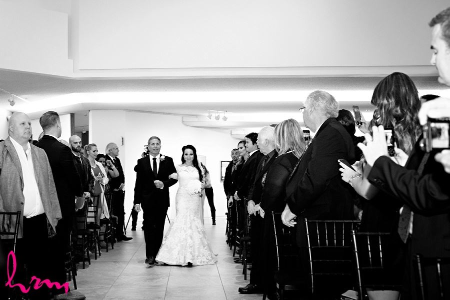 Lauren walking down the aisle at Museum London London ON Wedding Photography