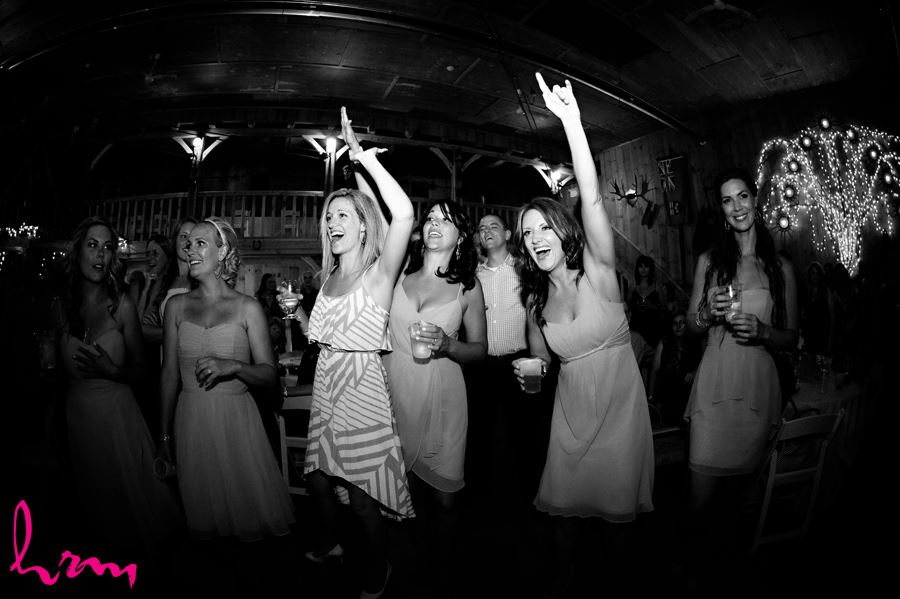 Black and white photo dancing with guests Purple Hill Country Farms London ON Wedding Photography