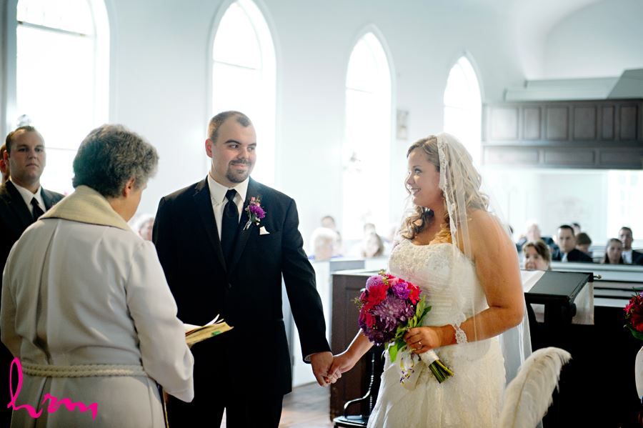 Mallory and Will at the altar St. Thomas ON Wedding Photography