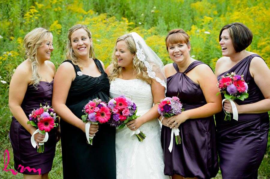 Mallory and bridesmaids outside after wedding The Old St. Thomas Church St. Thomas ON Wedding Photography