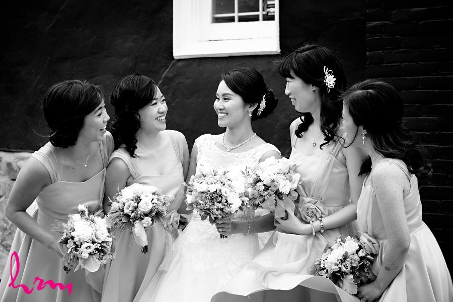 Natalie and bridesmaids outside Chinese Martyrs Catholic Church Toronto ON Wedding Photography