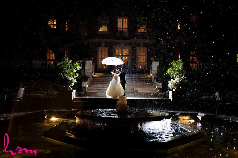 Natalie and Michael in moonlight by fountain at Graydon Hall Manor Toronto ON Wedding Photography