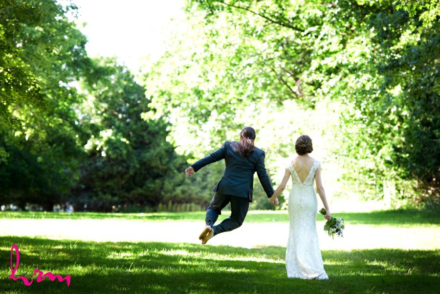 Groom clicking heels together jumping
