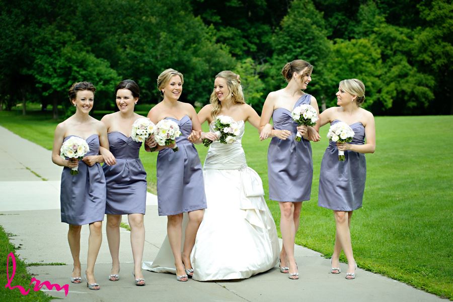 Bride with her bridesmaids in purple dresses at Western University