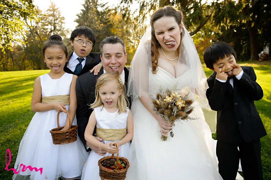 Flowergirls and ring-bearers with bride and grooms outside Windermere Manor London ON Wedding Photography